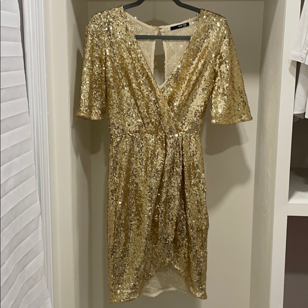 Gold sequined metallic plunge neck dress